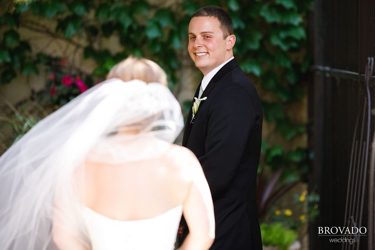 Tyler smiling at Annie during first look