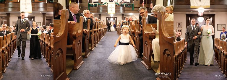 Flower girl and bridesmaids walking down the aisle