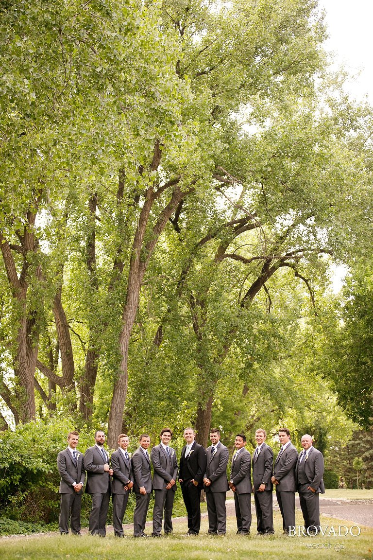 Groomsmen posing along st anthony main