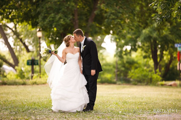 Bride and groom kissing in Minneapolis park