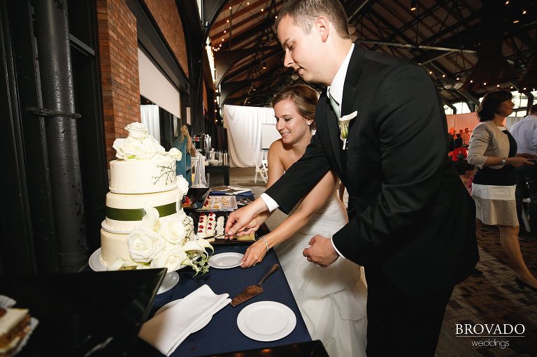 Annie and Tyler cutting their cake