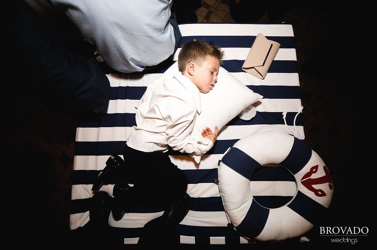 Kid asleep at wedding reception