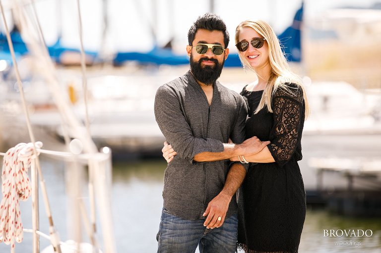 Ajit and Jenna wearing sunglasses in the marina