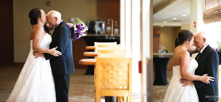 Sally kissing Daniel on the forehead