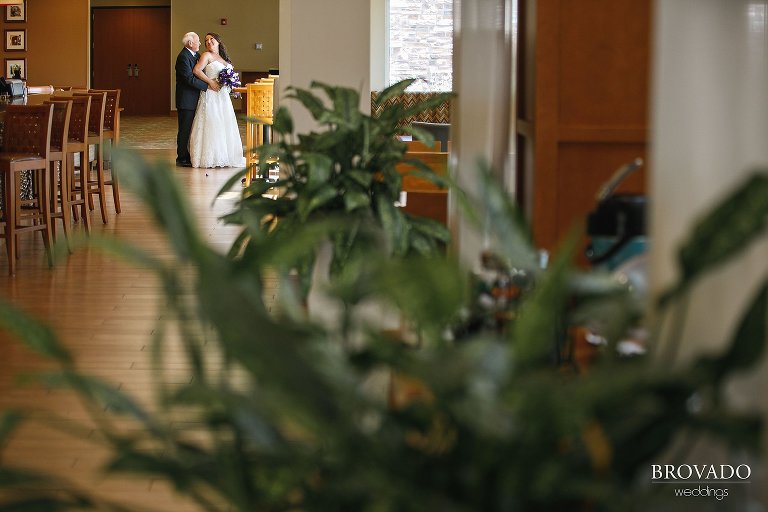 Wide angle of Bride and Groom having a moment