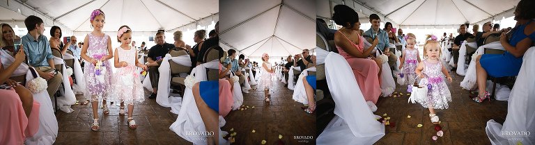 Five flowergirls walking down the aisle