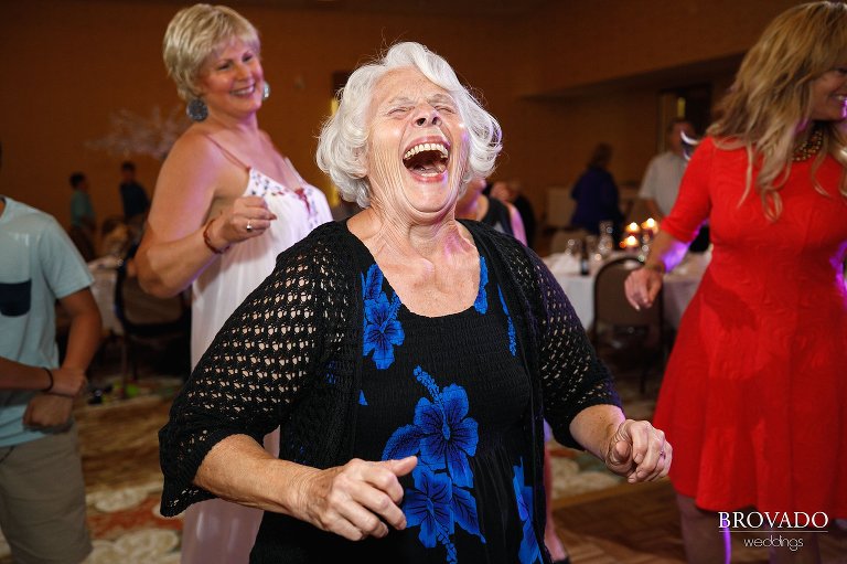 Wedding guest laughing on the dance floor