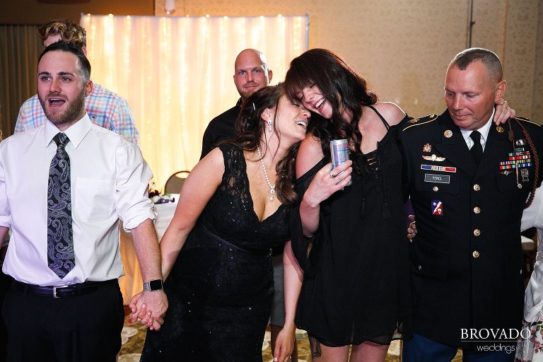 Mother and daughter dancing together