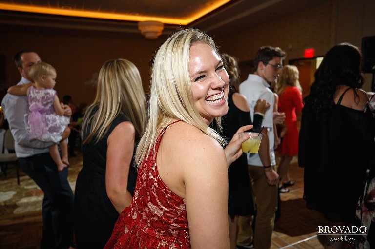 Wedding guest laughing and dancing