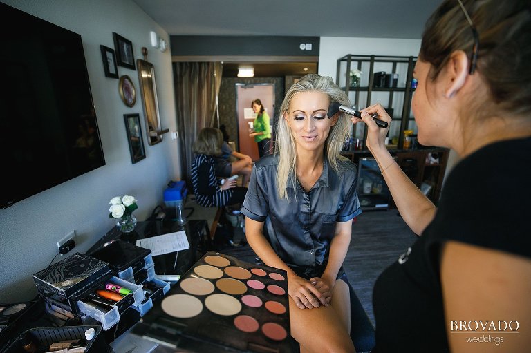 Bridesmaid having her makeup done