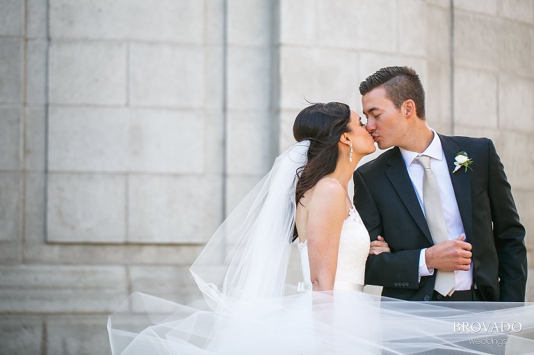 Bride and groom kissing