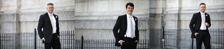 Groomsmen showing off sleek black tuxedos
