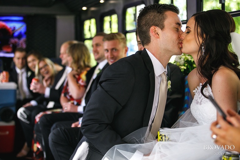 Laura and Michael kissing on party bus