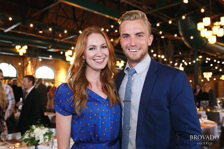 Couple smiling at wedding reception