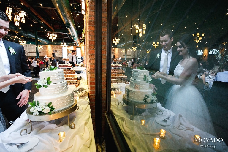 Bride and groom cutting the cake