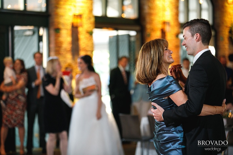Mother of the groom dancing with her son