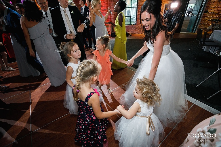 Laura dancing with flowergirls