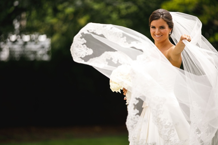 Bride Julianne throwing her veil towards the camera
