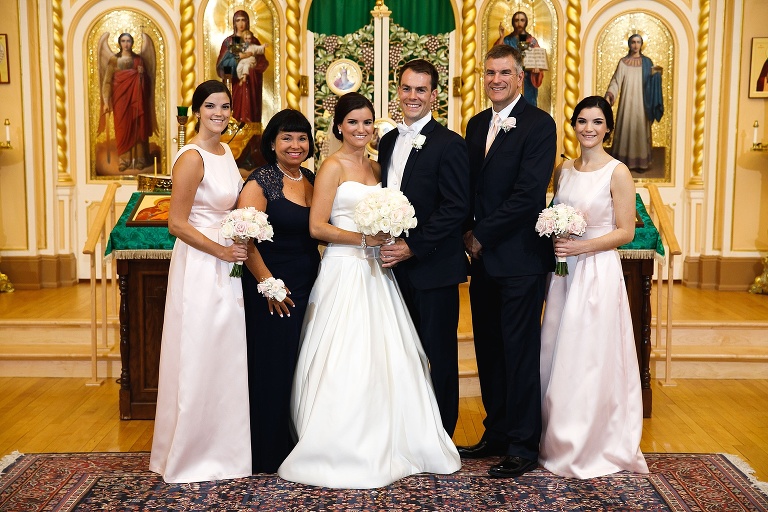 Julianne and Nick posing with family