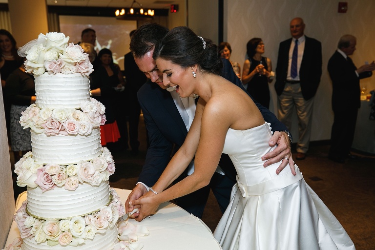 Julianne and Nick cutting the cake