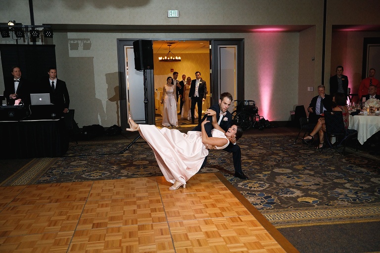Groomsmen dipping bridesmaid