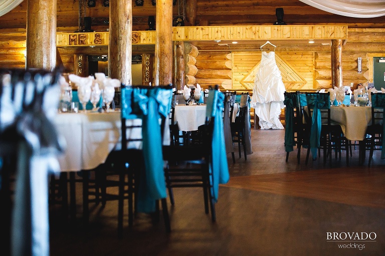 Wedding dress hanging in glenhaven event center ballroom