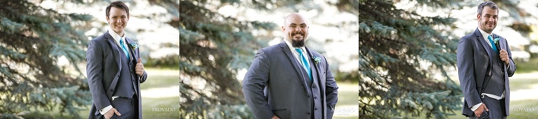 Groomsmen posing in grey suits