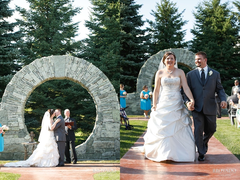 Bride and groom share first kiss and walk down the aisle