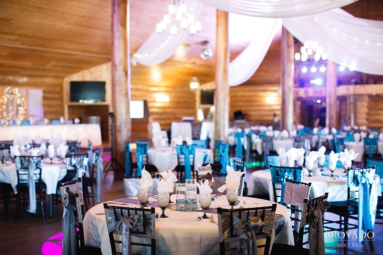 Blue and purple wedding reception setup