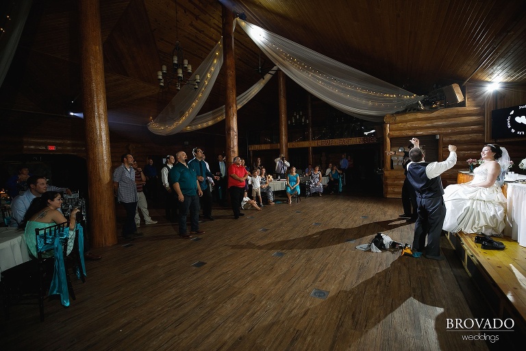 Kevin throwing the garter over his shoulder
