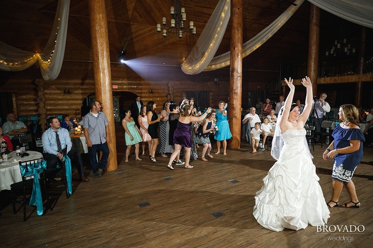 Elizabeth throwing her bouquet