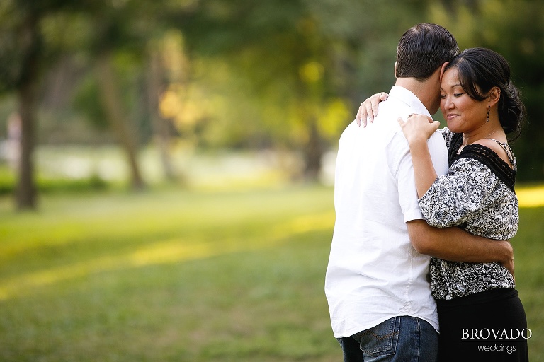 Christine holding Nick and smiling for the camera