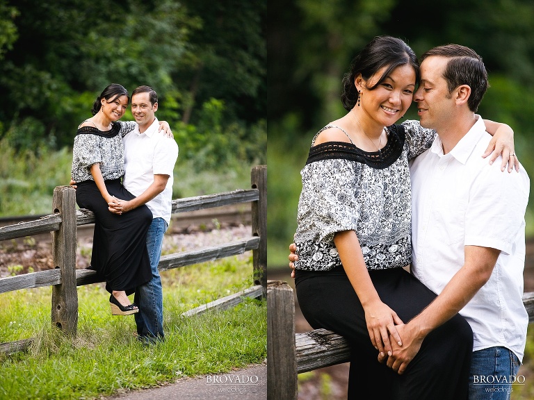 Christine sitting on wooden fence