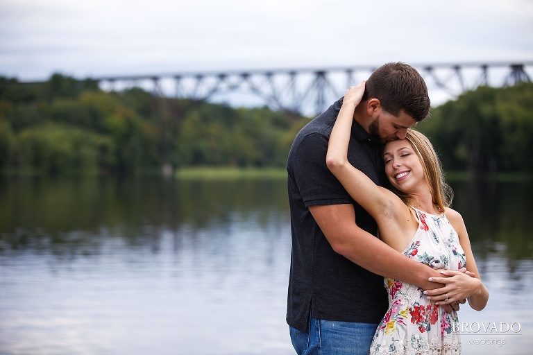 Natalie and Josh standing in front of st croix bridge