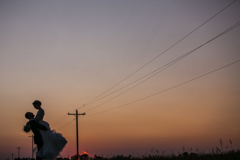 Sunset silhouette of Zach and Coty