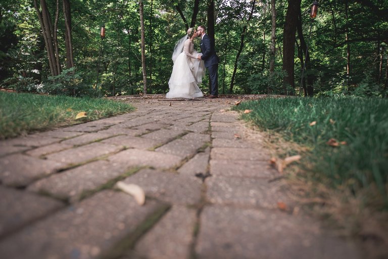 Wide angle of Zach and Coty kissing