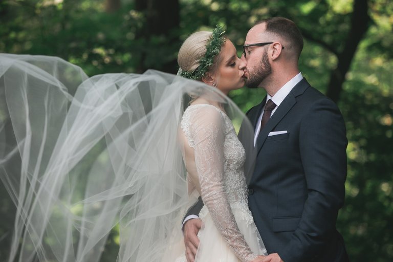 Veil toss while Zach and Coty kiss