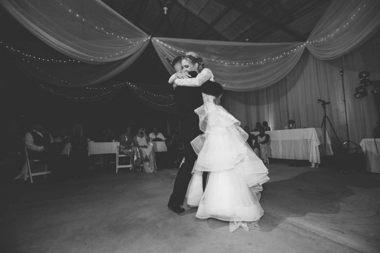 Zach spinning his bride around during first dance
