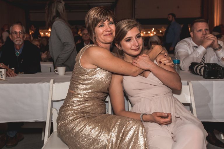 Guests tearfully watching first dance