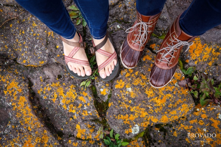 Closeup of brides hiking boots and chacos