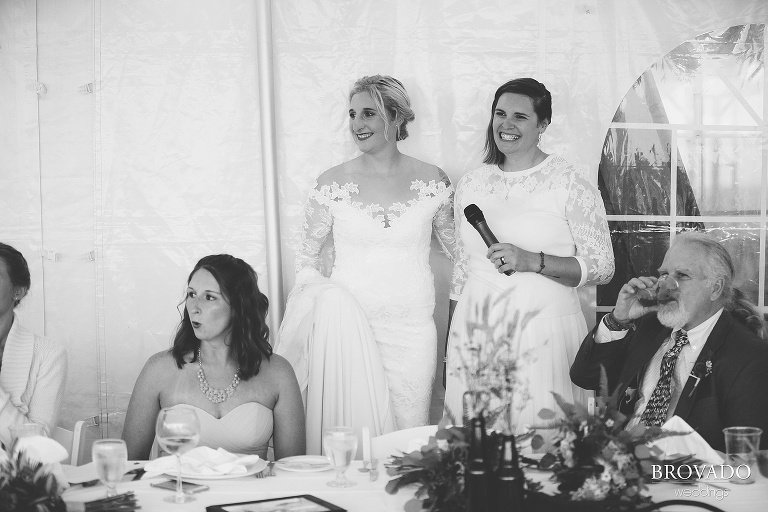 Nina and Karen giving a speech at their wedding reception