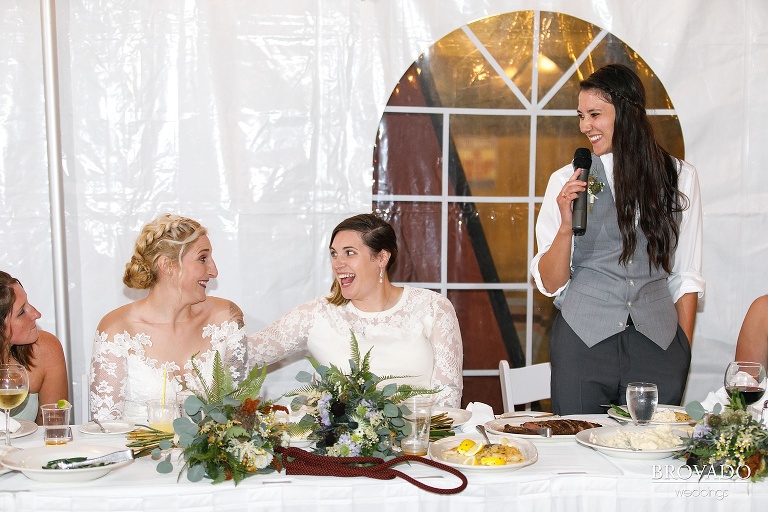 Karen's wedding party giving a speech