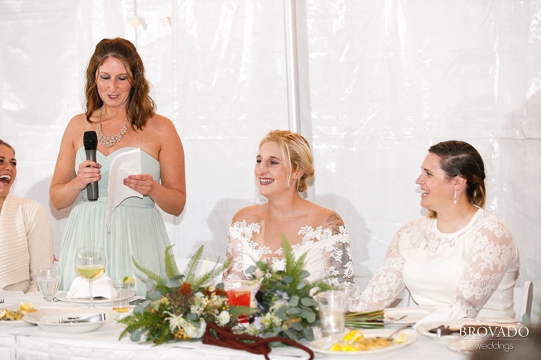 Nina's sister giving a wedding toast at lutsen resort