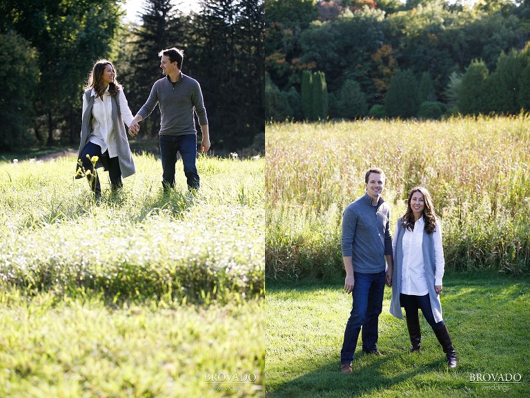 Hannah and Jason walking through a field