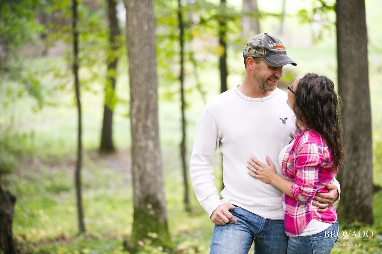 Kelly and Robert smiling at one another