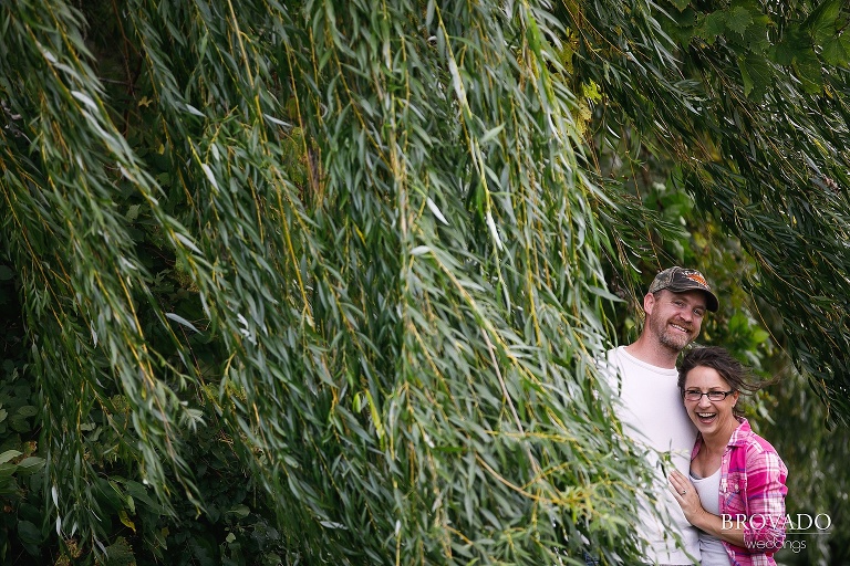 Laughing candid of engaged couple