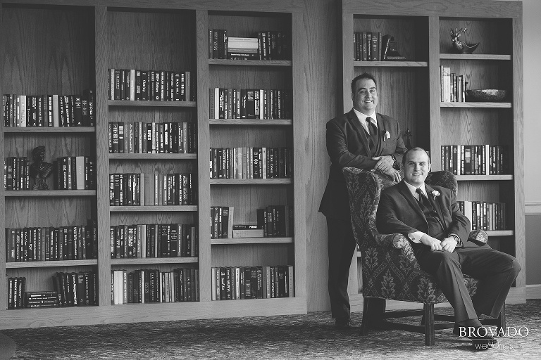 Tom and Zach posing in front of a library