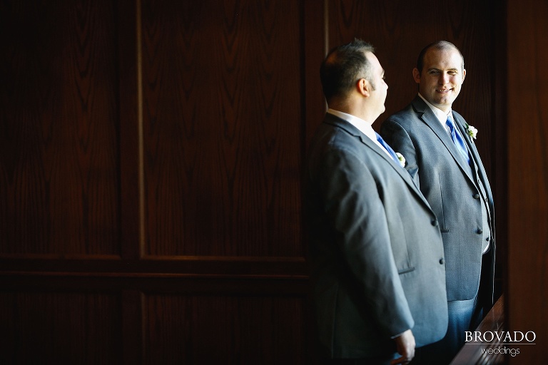 Tom and Zach against a dark wood backdrop