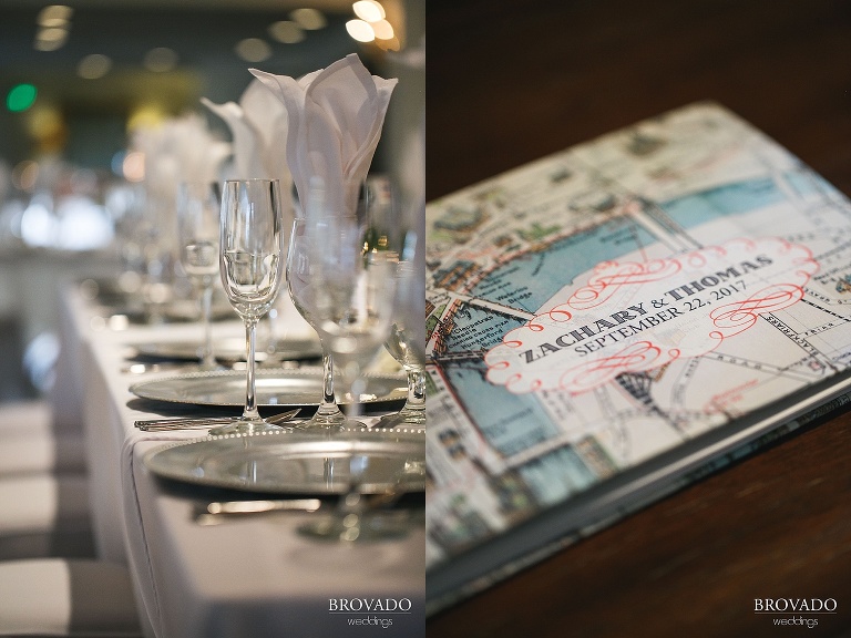 Detail of champagne glasses and map themed guest book