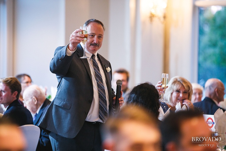 Father of the groom toasting